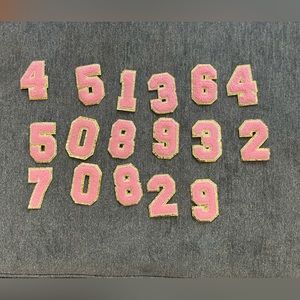 Pink and gold iron on numbers